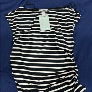 Never worn sleeveless shirt. Animal/smoke free.